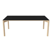Black tabletop with natural wood legs, featuring a sleek, modern design perfect for contemporary spaces.