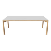 White tabletop with natural wood legs, featuring a minimalist design and smooth surfaces for a modern look.