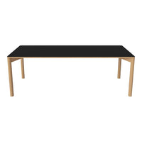 Black tabletop with a smooth finish, paired with natural wood legs, creating a sleek and modern design.