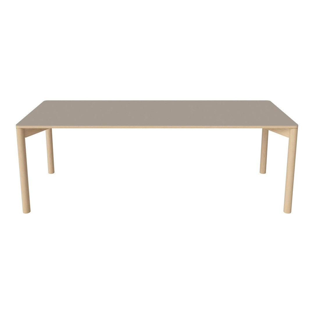 Beige tabletop with natural wood legs, sleek and minimal design for modern dining spaces. 