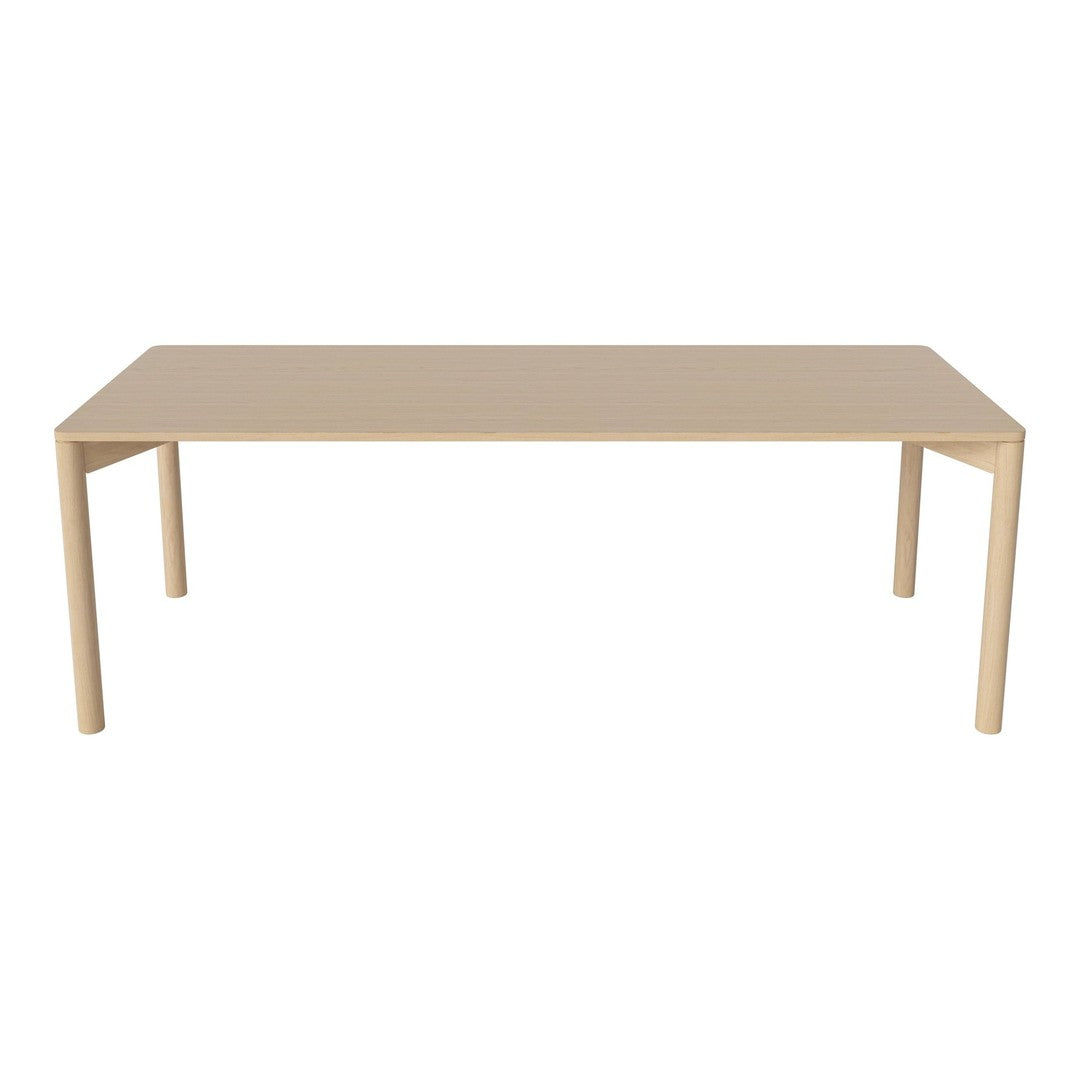 Beige rectangular dining table with a smooth, minimalist design and sleek, straight legs. Perfect for modern interiors.
