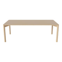Beige rectangular table with smooth surface and simple, clean lines. Ideal for modern and minimalist decor.