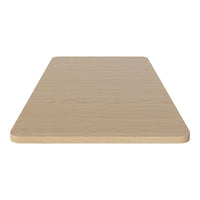 Light natural wood tabletop with a smooth, minimalist design and soft, rounded edges.