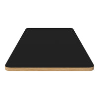 Black tabletop with a smooth finish and natural wood edges. Perfect for modern decor.