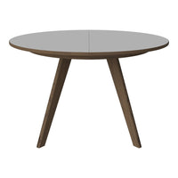 Round table with a smooth gray top and natural wood legs, featuring a minimalist design with no patterns.