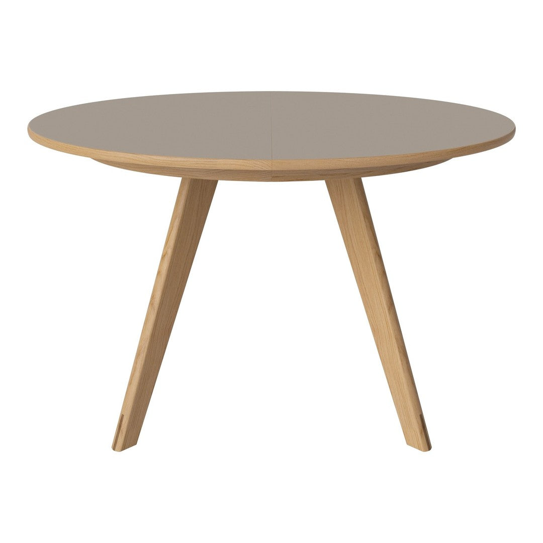 Round coffee table with a sleek gray surface and natural wood tapered legs, featuring a minimalist design.