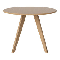 Round wooden table with a natural finish and light oak color, featuring sleek, simple legs. Perfect for modern decor.