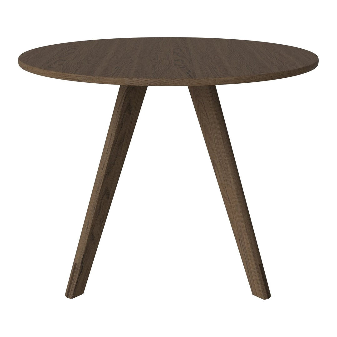 Round wooden table in a rich dark brown finish with minimalist light brown tapered legs. Perfect for modern decor.