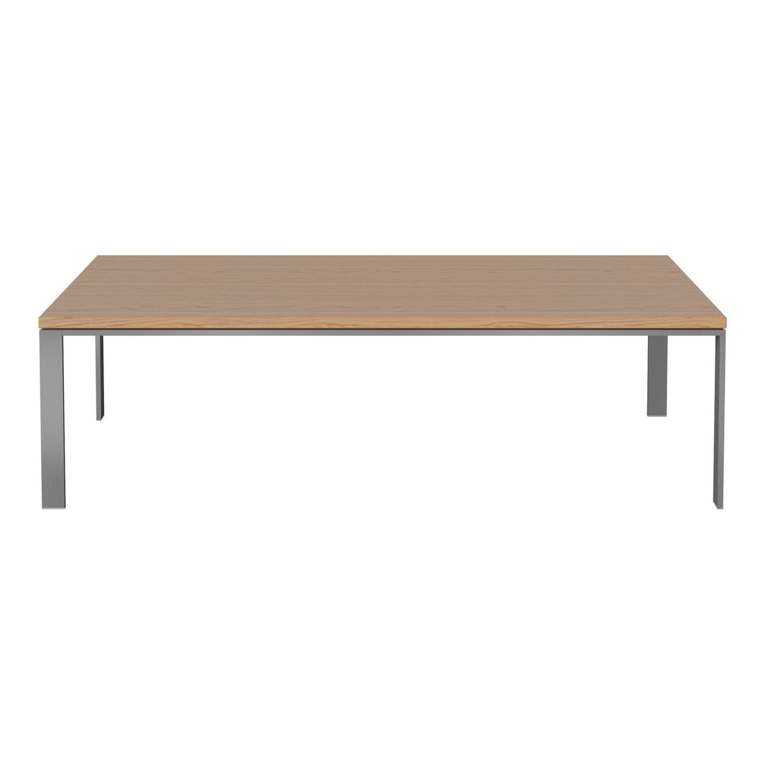 Modern rectangular table with a light wood surface and sleek silver metal legs, perfect for contemporary decor.