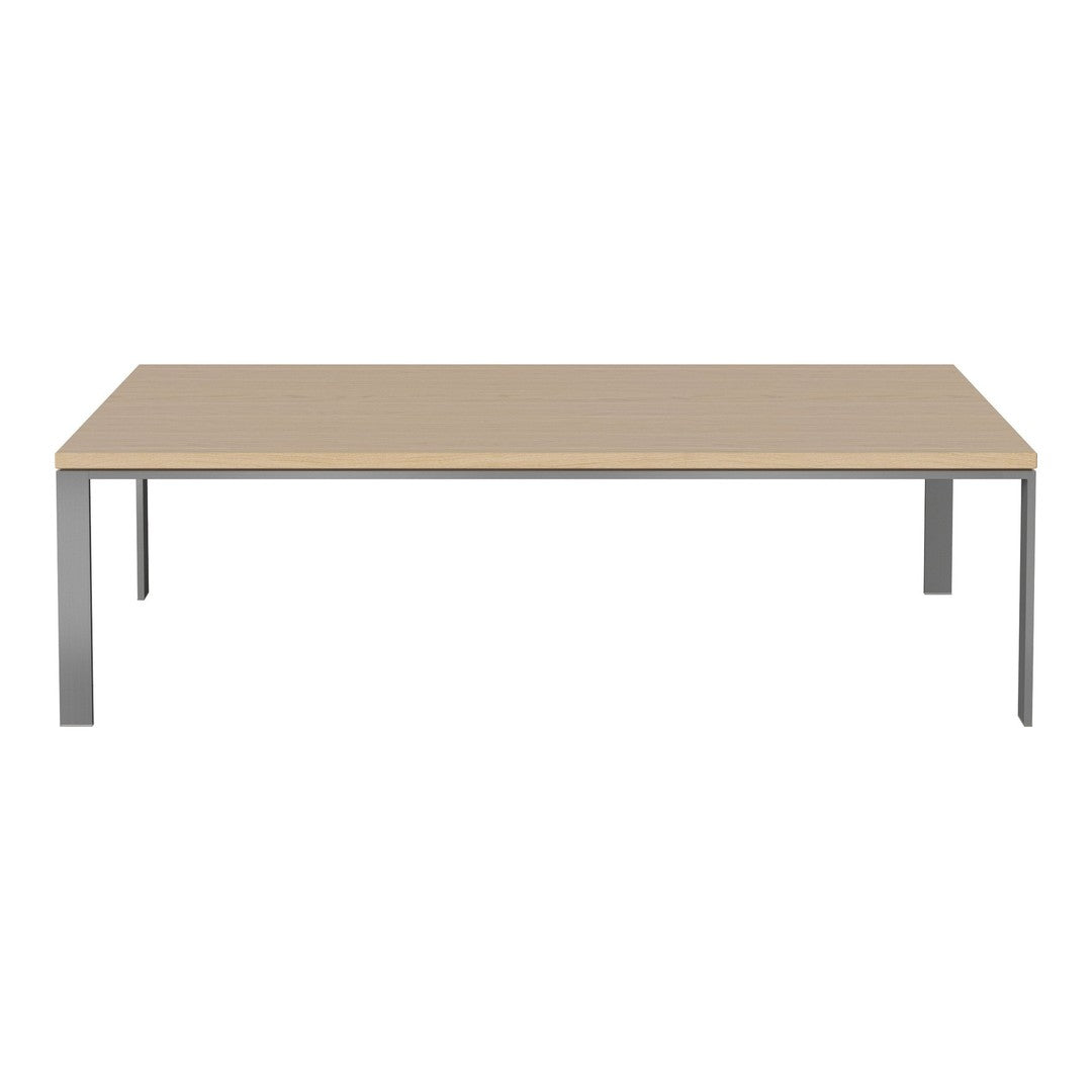 Beige rectangular tabletop with sleek silver metal legs, minimalist design perfect for contemporary spaces.