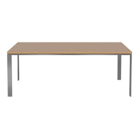 Light wood tabletop with a smooth finish and sleek silver metal legs, featuring a minimalist design.