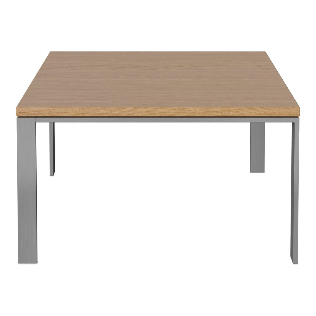 Light wood tabletop with a smooth finish and sleek silver metal legs. Simple, modern design, perfect for any decor.
