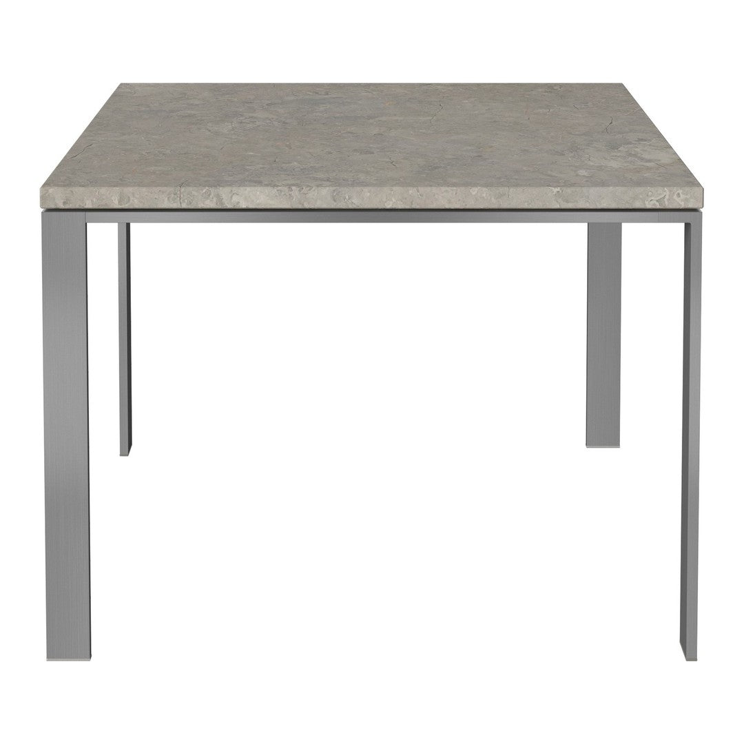 Square table featuring a textured gray stone top and sleek silver metal legs. Modern and minimalist design.