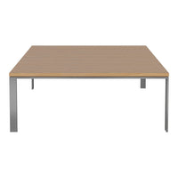 Light wood tabletop with smooth grain pattern, supported by sleek silver metal legs. Modern design for any decor.