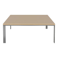 Square table with a smooth light wood top and sleek silver metal legs, showcasing a minimalist design.