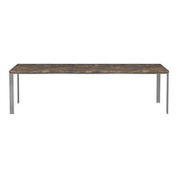 Long, rectangular table featuring a rustic brown surface with subtle textures and sleek silver legs. Perfect for modern settings.