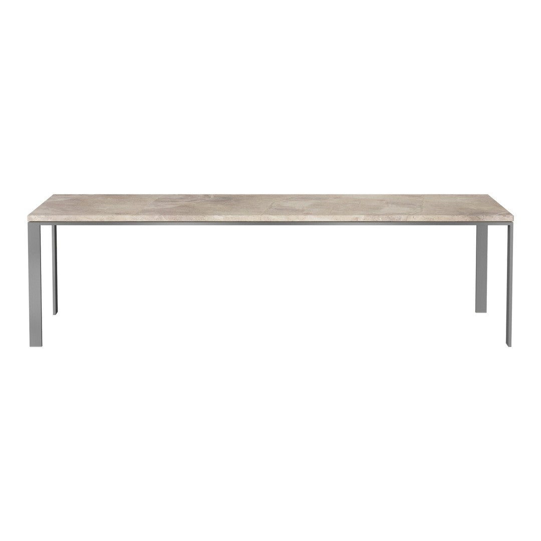 Long rectangular dining table with a light grey surface and sleek silver metal legs, minimalistic design.