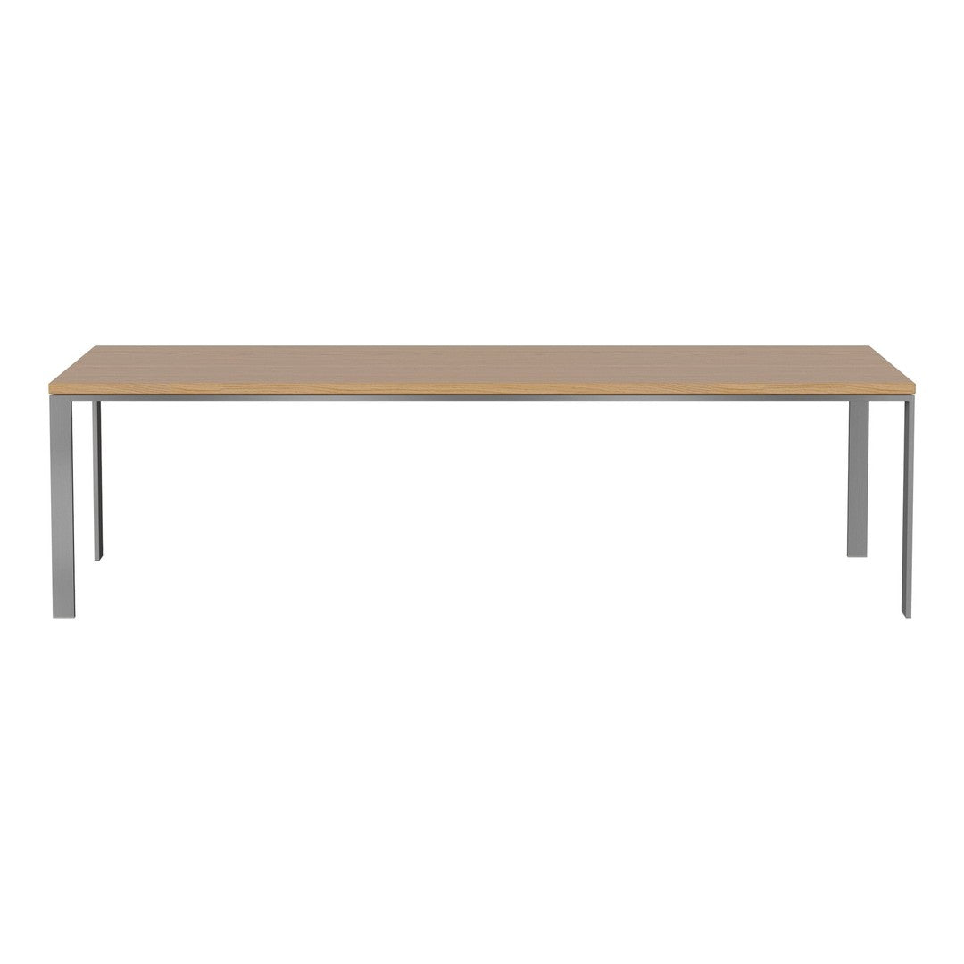 Light wood tabletop with sleek silver legs, creating a modern and minimalist design. Perfect for home or office use.