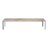 Gray stone tabletop with a smooth finish, supported by sleek silver metal legs. Contemporary modern design.