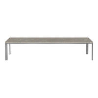Gray concrete tabletop with a smooth finish and sleek silver metal legs, perfect for modern decor.