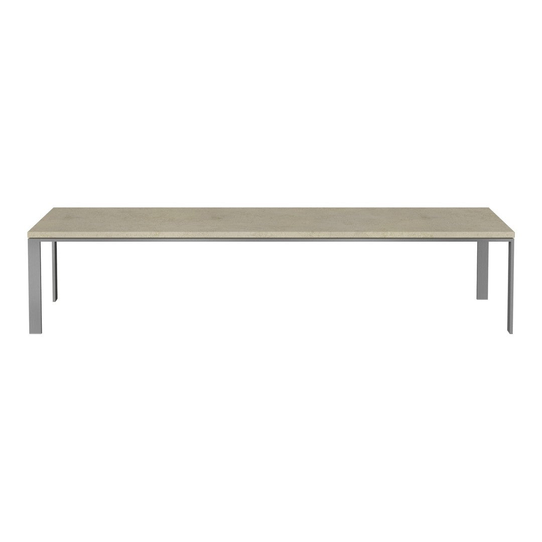 Rectangular dining table with a light gray wood finish and sleek silver metal legs, featuring a minimalist design.
