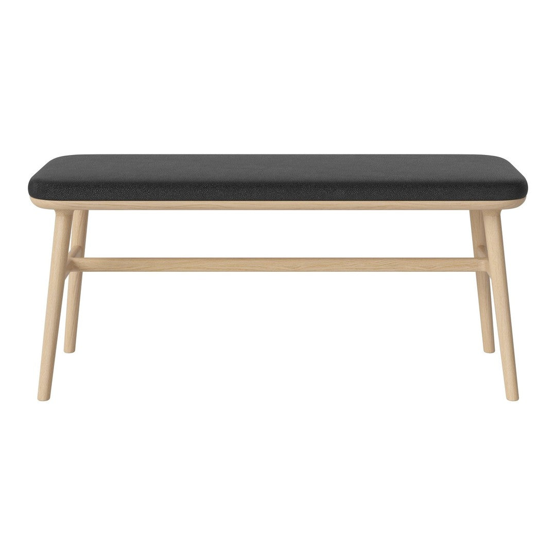 Black upholstered bench with a light wood frame, featuring clean lines and a minimalist design. Perfect for modern decor.