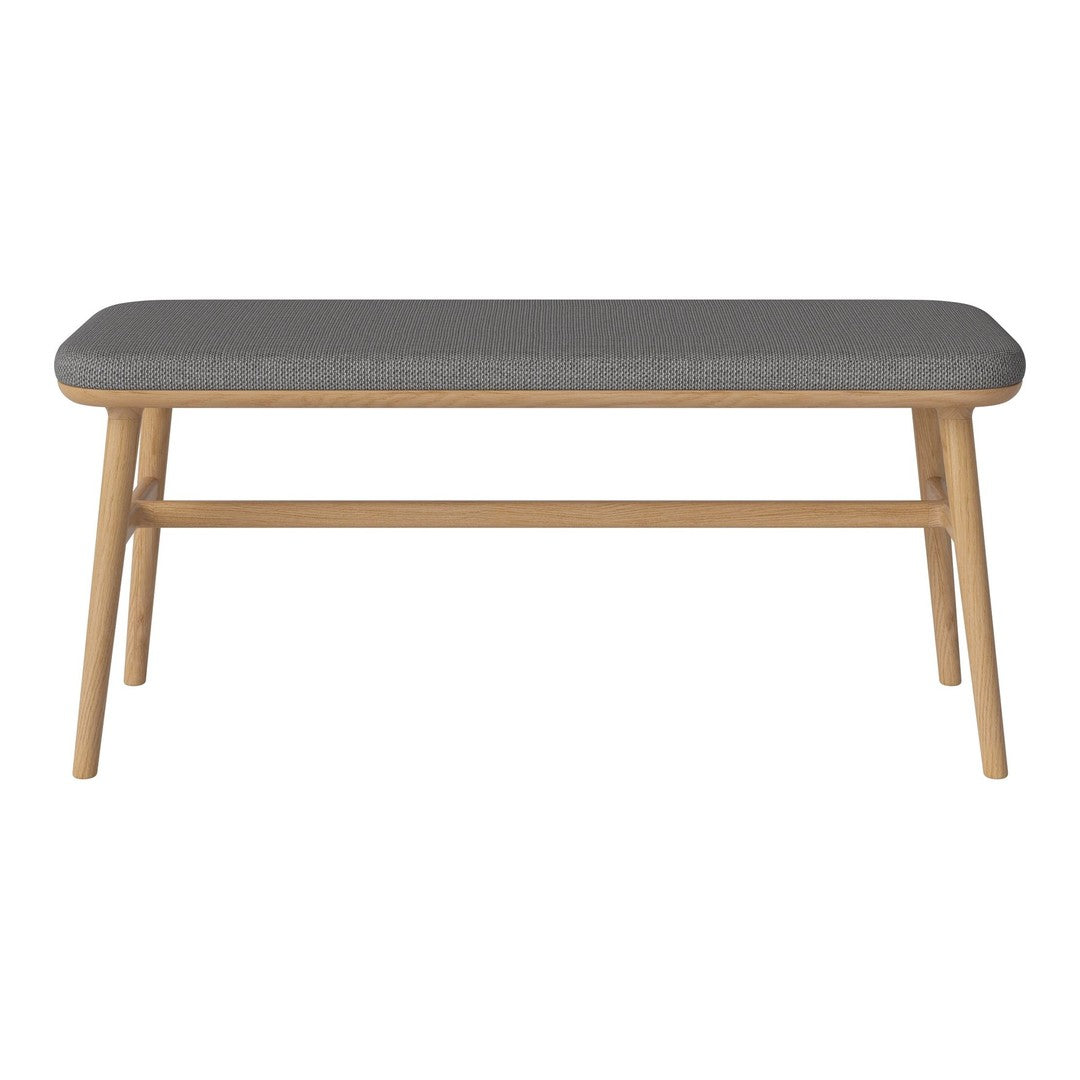Stylish coffee table with a sleek gray top and warm light wood legs, perfect for modern decor.