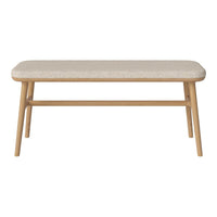 Light beige tabletop with a subtle pattern, supported by light wood legs. Modern and minimalist design.
