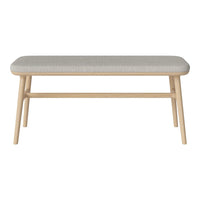 Light wood bench with a soft gray upholstered top, featuring a minimalist design and natural finish. Ideal for modern decor.