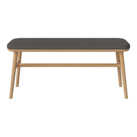 Stylish dark gray tabletop with natural wood legs, featuring a sleek and minimalist design. Perfect for modern decor.