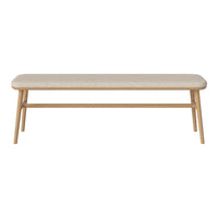 Light beige upholstered bench with a natural wood base, featuring a minimalistic design and no visible patterns.