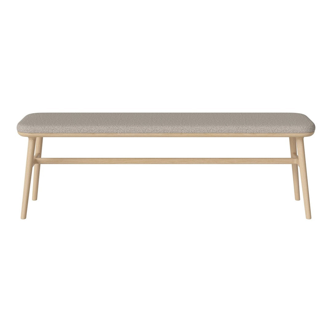 Light beige upholstered bench with a smooth surface and natural wood legs, ideal for modern decor.