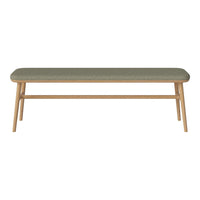 Green upholstered bench with a minimalist design and natural wood legs, perfect for modern decor.