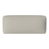 Beige upholstered headboard with subtle vertical ribbing pattern, adding texture and sophistication to bedroom decor.