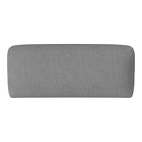 Gray upholstered headboard with a smooth, textured finish, adding a modern touch to bedroom decor.