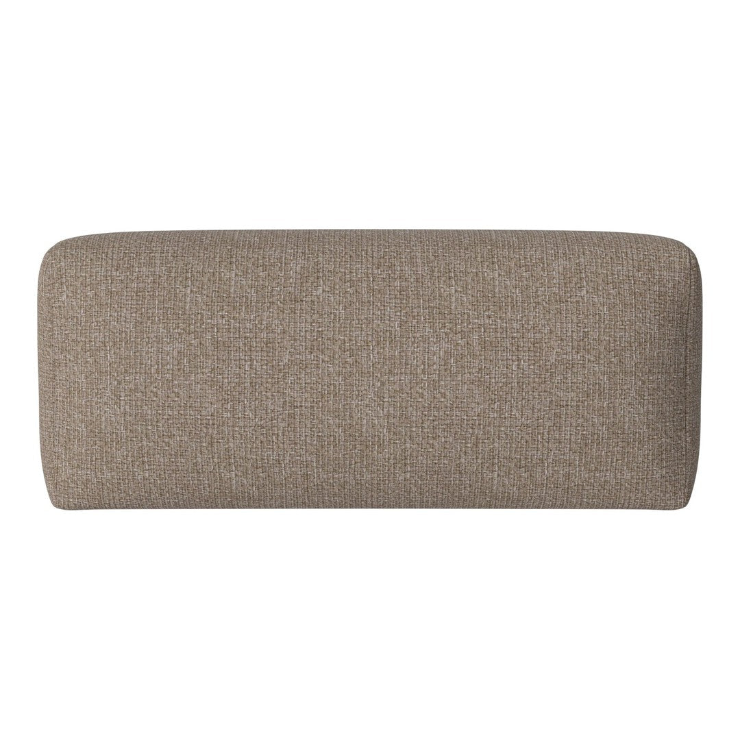 Soft beige fabric with a subtle textured pattern on a rectangular cushion. Ideal for modern decor.