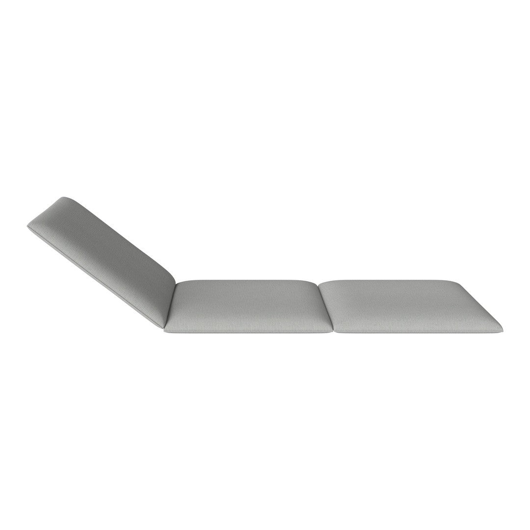Gray chaise lounge with a sleek, minimalist design and smooth, solid fabric upholstery. Perfect for modern spaces.