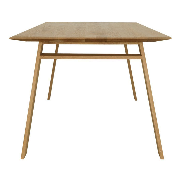 Natural wood dining table with a smooth finish and minimalist design, featuring light oak color and simple geometric lines.