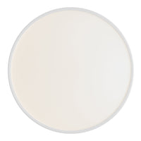 Round mirror with a glossy white surface and a sleek silver border, enhancing modern decor.