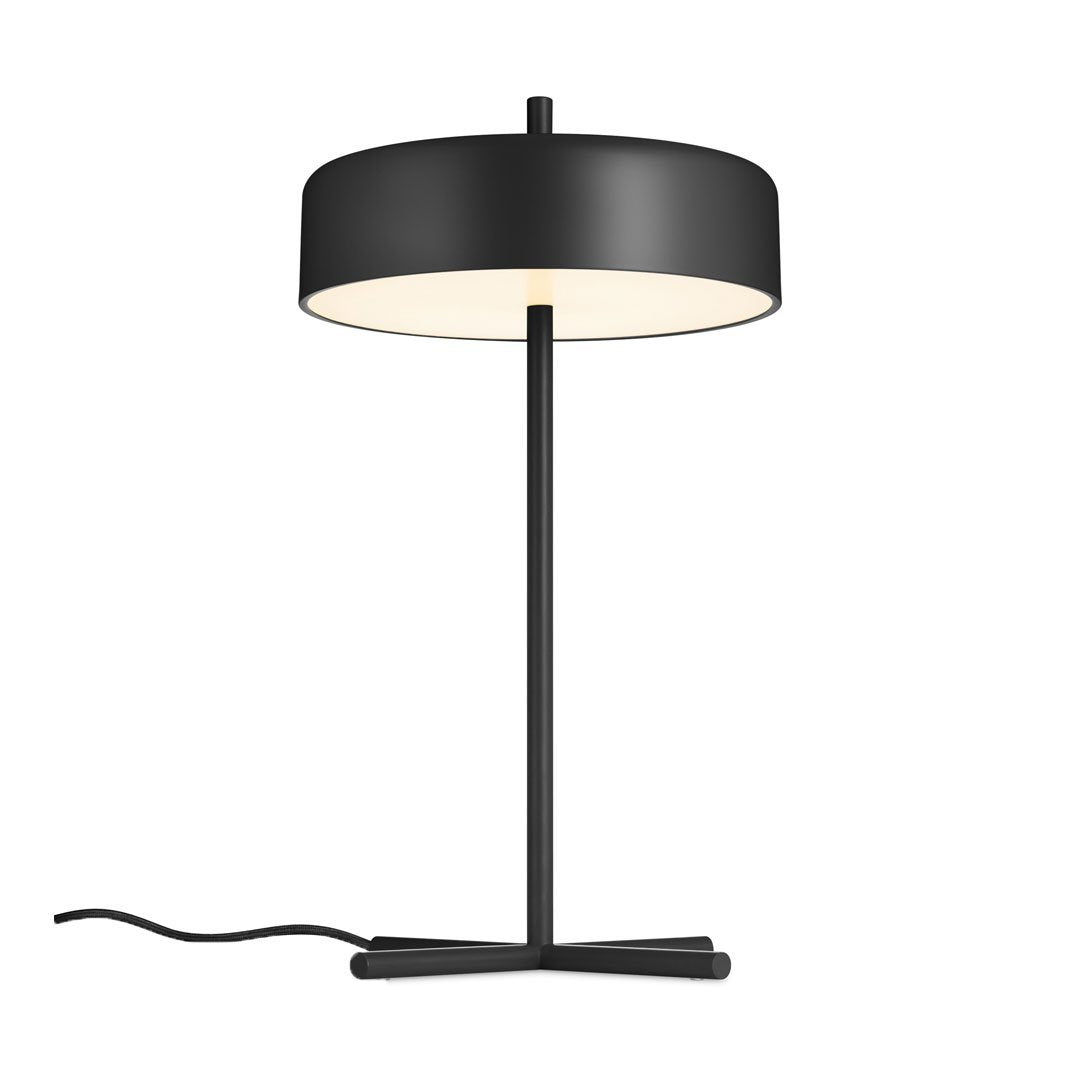 Black table lamp with a sleek round shade and contrasting white interior, featuring a minimalist design and elegant lines.