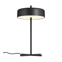 Black table lamp with a sleek round shade and contrasting white interior, featuring a minimalist design and elegant lines.