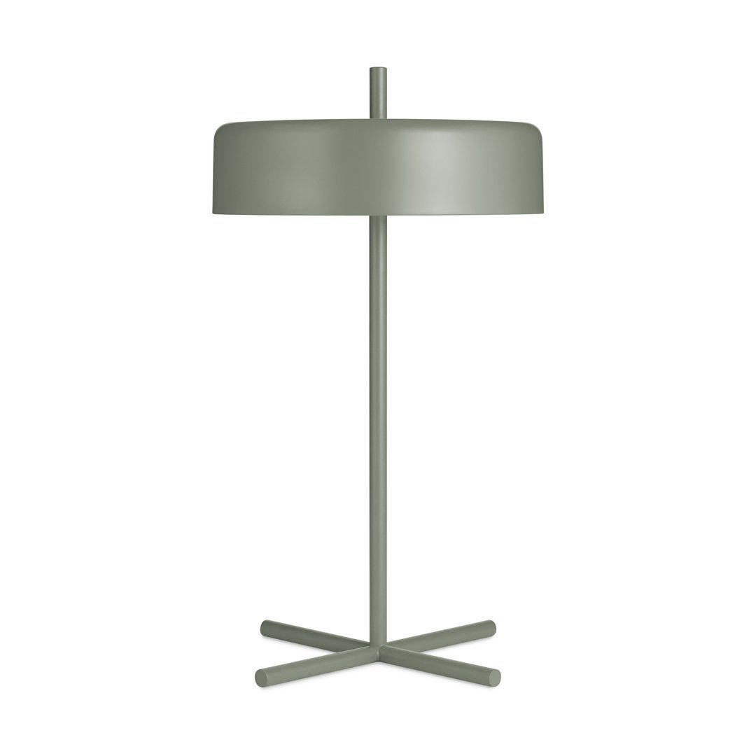 Stylish green metal lamp with a smooth, rounded shade and sleek, minimalistic design. Perfect for modern decor.