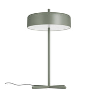 Green minimalist table lamp with a wide round shade and sleek standing base. Ideal for modern decor.