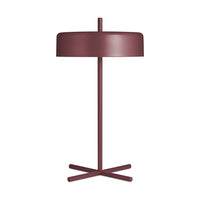 Modern burgundy lamp with a sleek cylindrical shade and minimalist base, perfect for stylish home decor.