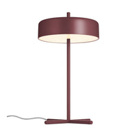 Modern burgundy table lamp with a round shade and sleek metal base, featuring a minimalist design and warm white light.