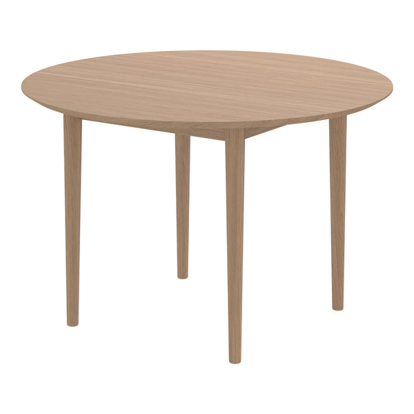 Light oak round dining table with simple, natural wood grain pattern and smooth finish. Ideal for modern interiors.