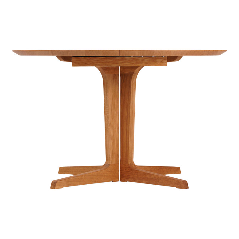 Wooden dining table with a sleek, natural finish and a minimalist design featuring clean lines and sturdy legs.