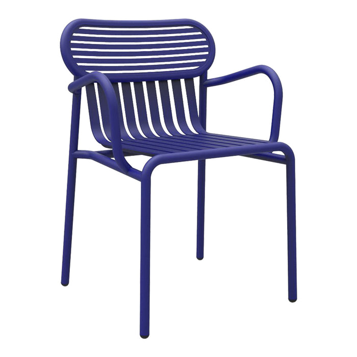 Vibrant purple slatted dining chair with curved arms and modern design, perfect for outdoor or patio use.