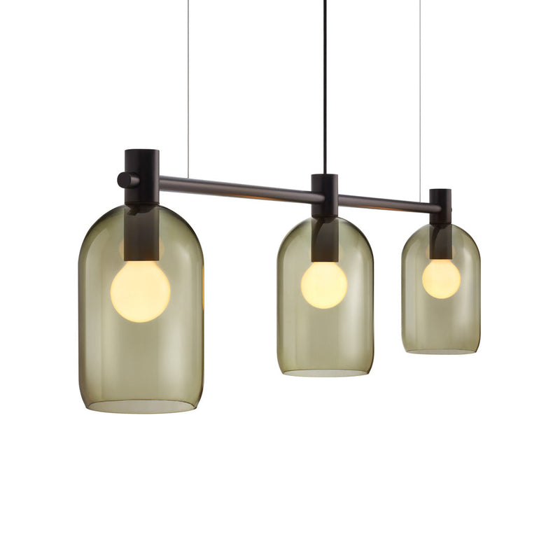 Three pendant lights featuring an amber glass design with black accents and round frosted bulbs.