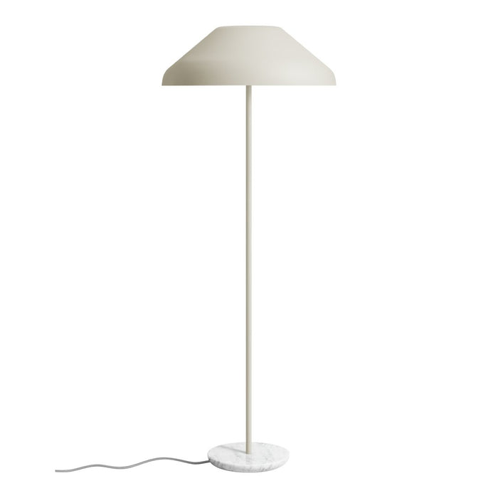 Minimalist white floor lamp with a smooth, dome shade and a sleek, cylindrical base in white marble. Ideal for modern decor.